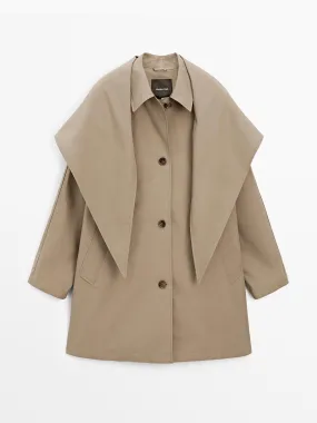 Trench coat with detachable scarf detail